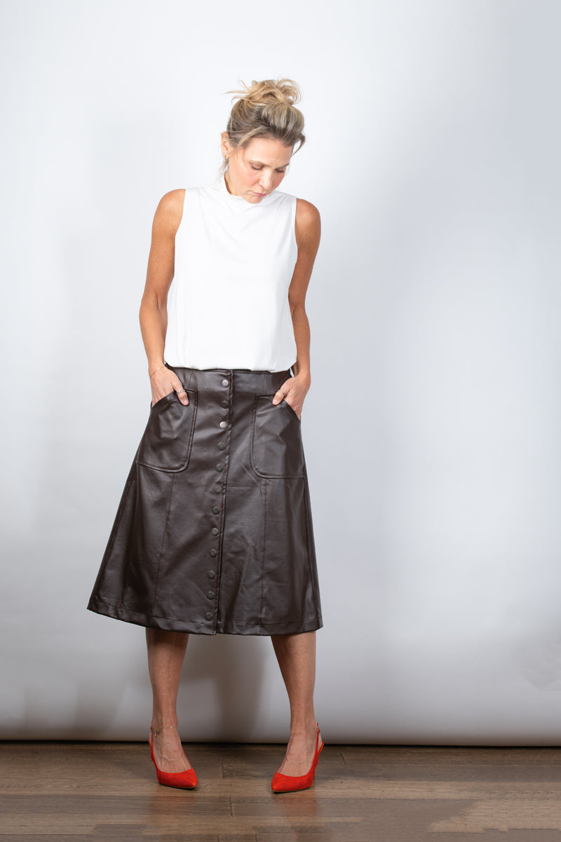 IRIS  גופיית מיני גולף לבנה