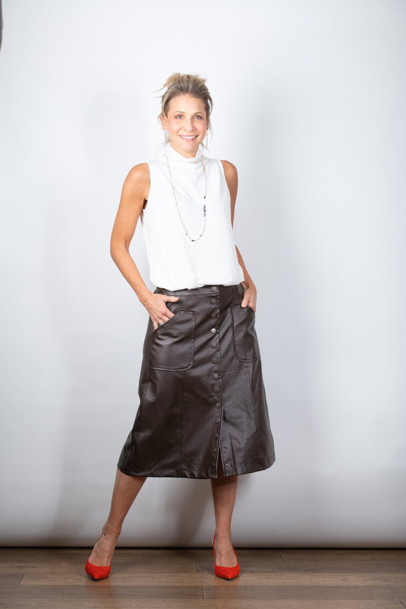 IRIS  גופיית מיני גולף לבנה